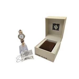 Anne Klein Women's Crystal Accented Bangle Watch Model AK/1868GBST
